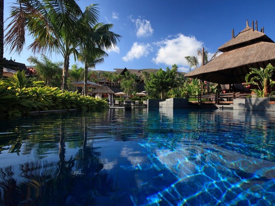 เอเชีย การ์เดน โฮเต็ล แอนด์ ไทย สปา อะ รอยัล ไฮดะเวย์ โฮเต็ล Hotel ฟีเนสตรัต ภายนอก รูปภาพ The pool at the Four Seasons Resort